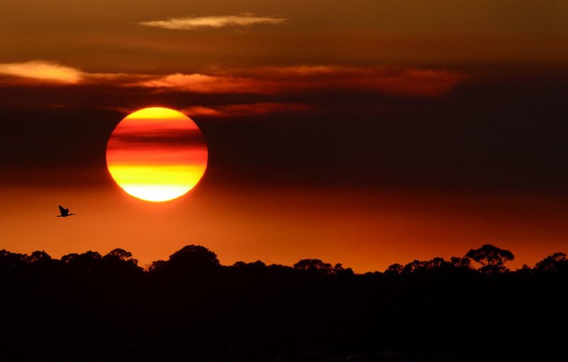 Where Is The Sky Most Likely To Look Orange?